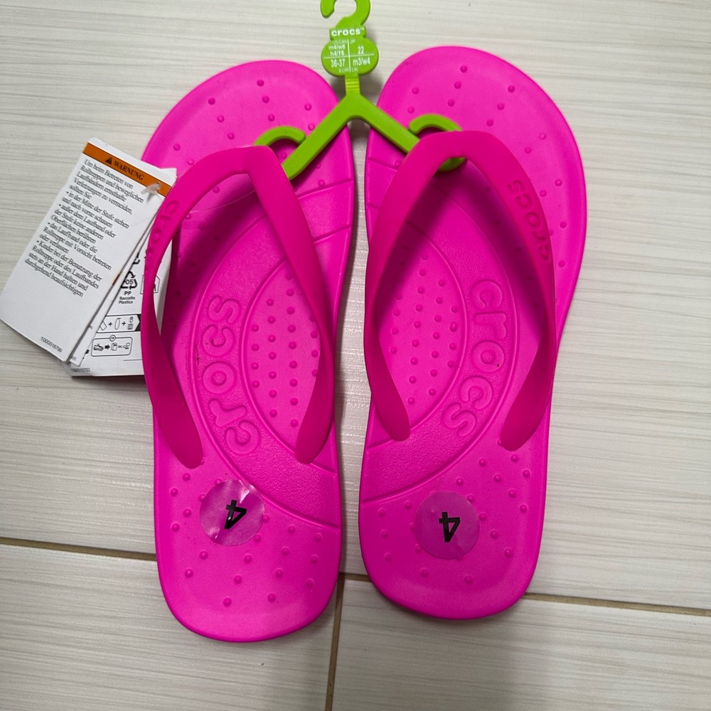 Crocs Kids Pink Flip Flops size 4
